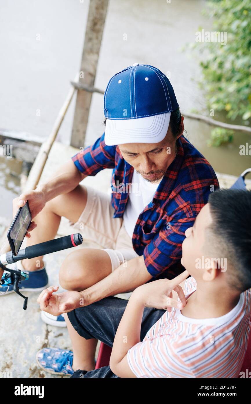 Talking father and son Stock Photo