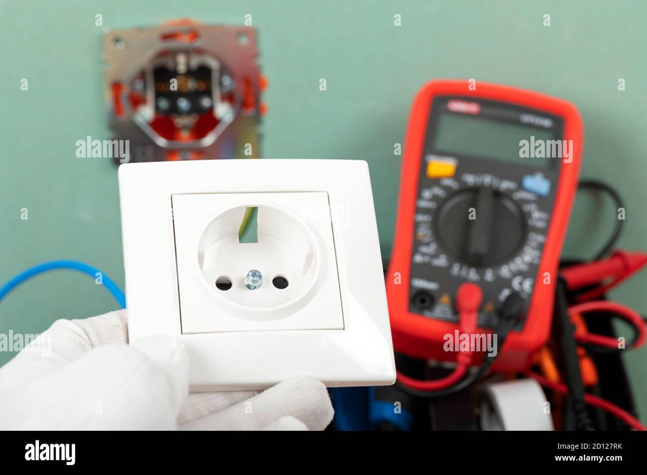Tools for electrician needs: multimeter, voltage testers, wire strippers, pliers, Stock Photo