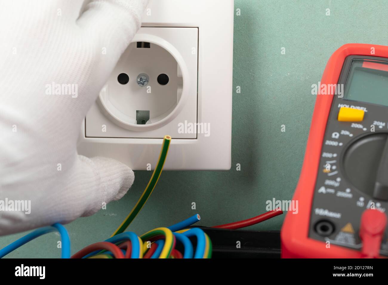 Tools for electrician needs: multimeter, voltage testers, wire strippers, pliers, Stock Photo