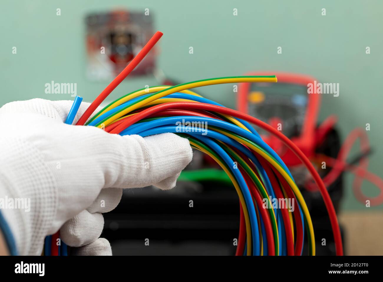 Tools for electrician needs: multimeter, voltage testers, wire strippers, pliers, Stock Photo