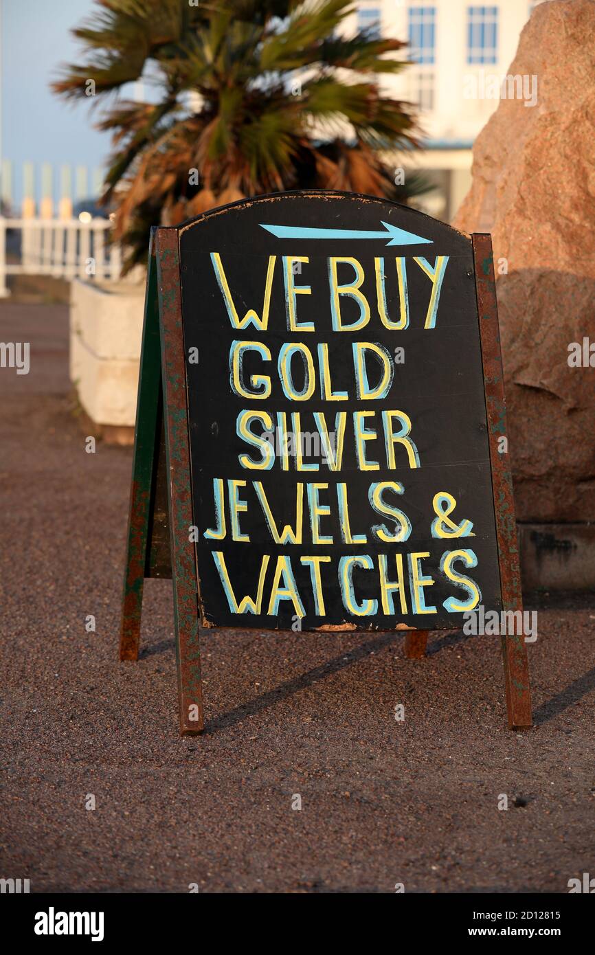 We buy gold sign in Hastings, East Sussex, UK. Stock Photo