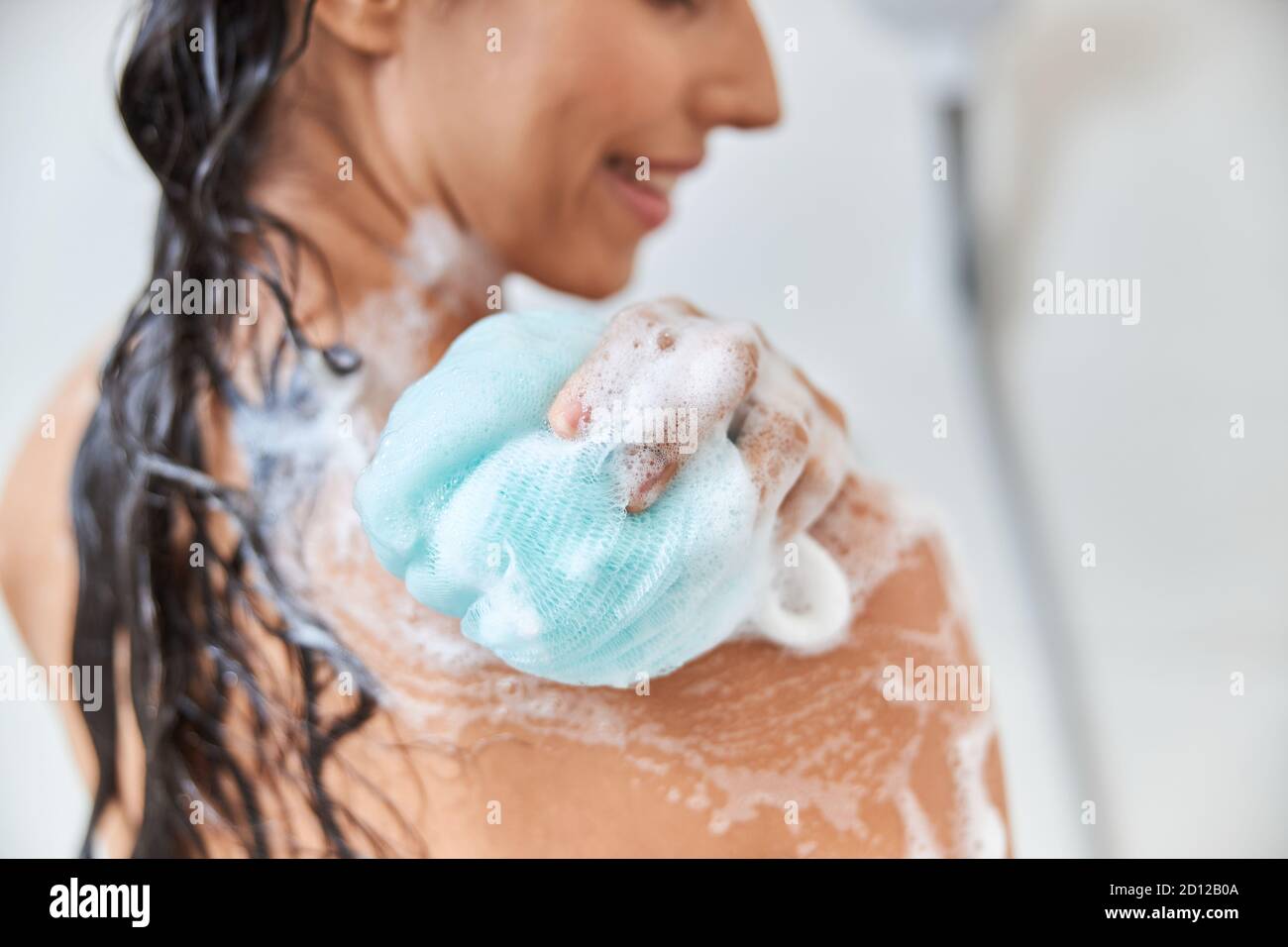 Woman exfoliating shower hires stock photography and images Alamy