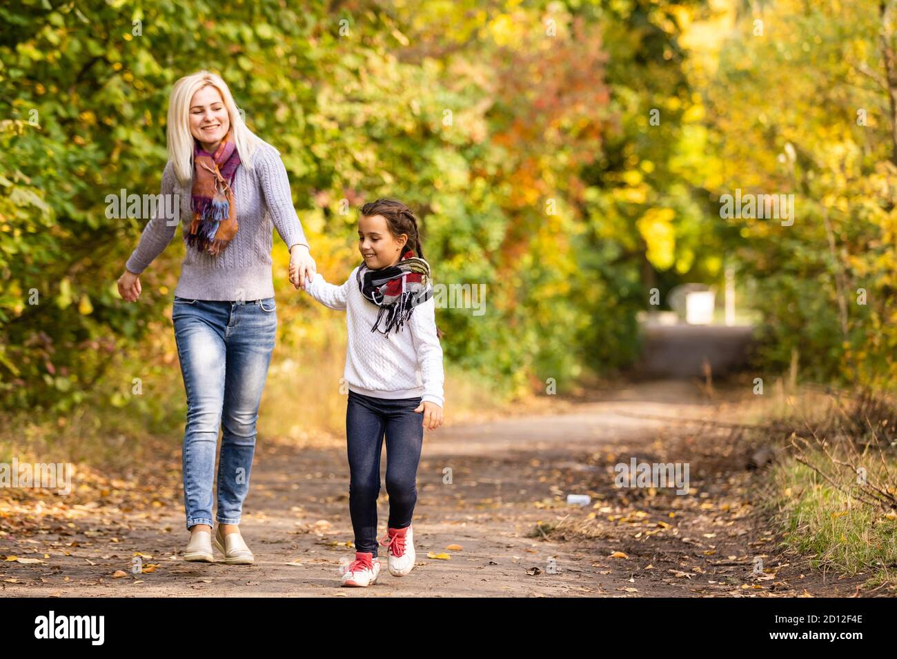 Young mother and her toddler girl have fun Stock Photo - Alamy