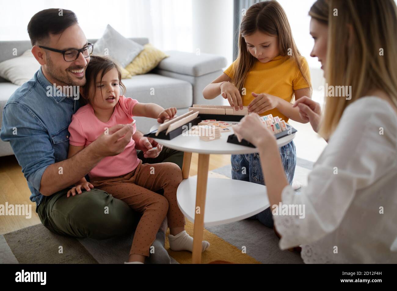 Happy family having fun times at home stock photo alamy