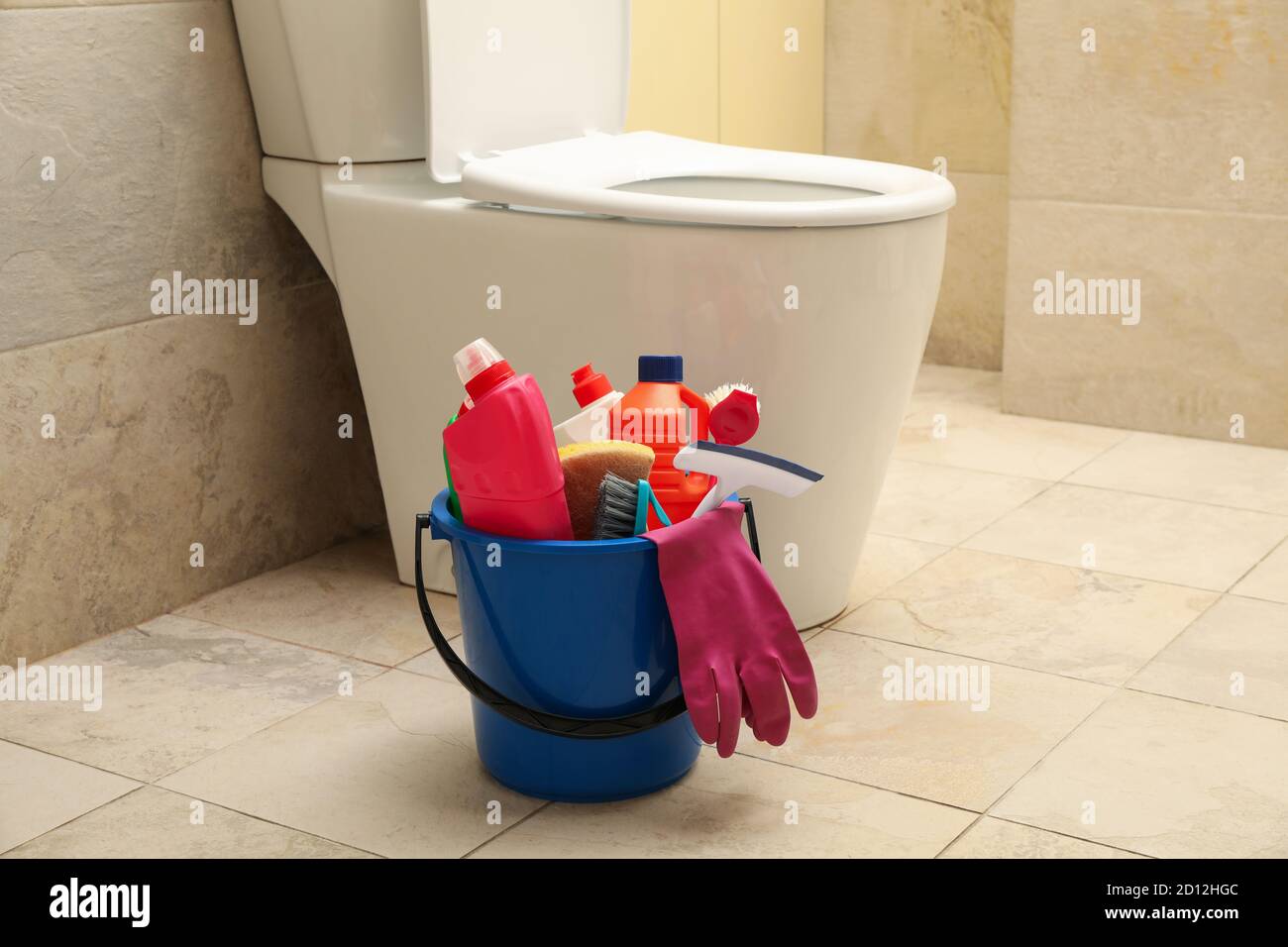 Bucket with cleaning products in modern bathroom Stock Photo Alamy