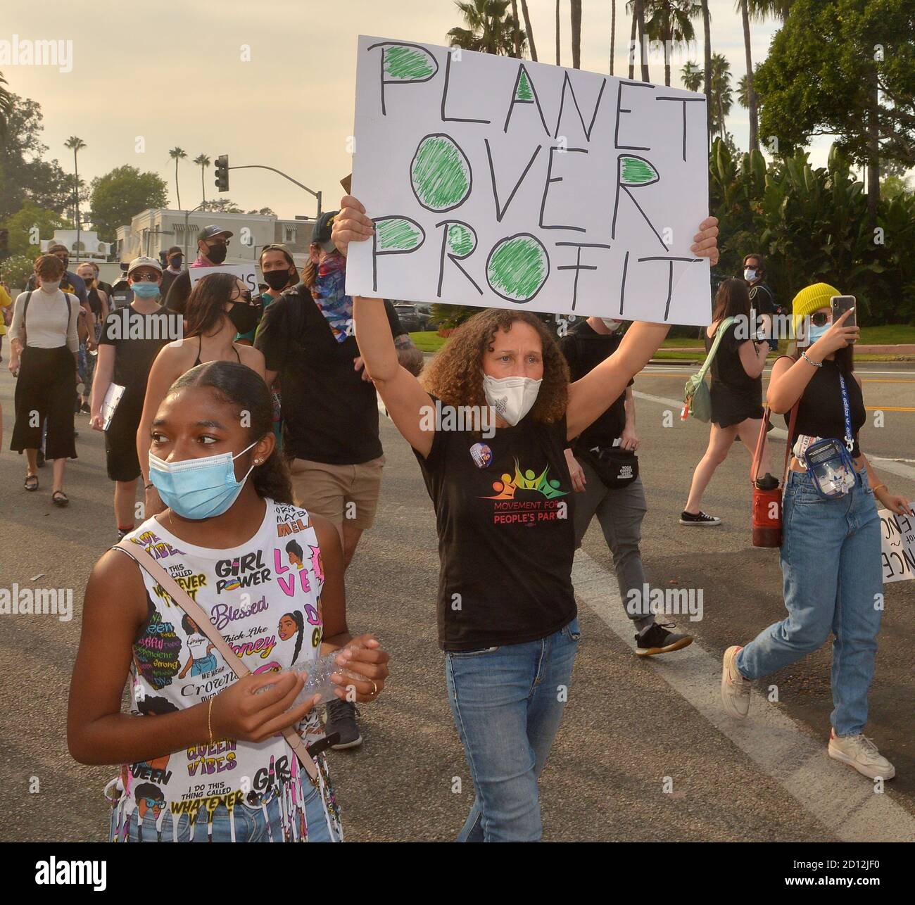 Beverly Hills, California, USA. 4th Oct, 2020. A coalition of labor and environmental activists march to the gate of Amazon founder Jeff Bezo's mansion in Beverly Hills, California on Sunday, October 4, 2020. Rally organizers called on Amazon to be 'transparent and honest about the number of (COVID-19) cases they have in their facilities'' and asking that buildings or locations that have positive cases be shut down, professionally sanitized, and remain closed for a minimum of 14 days with full pay for all affected employees. Photo by Jim Ruymen/UPI Credit: UPI/Alamy Live News Stock Photo