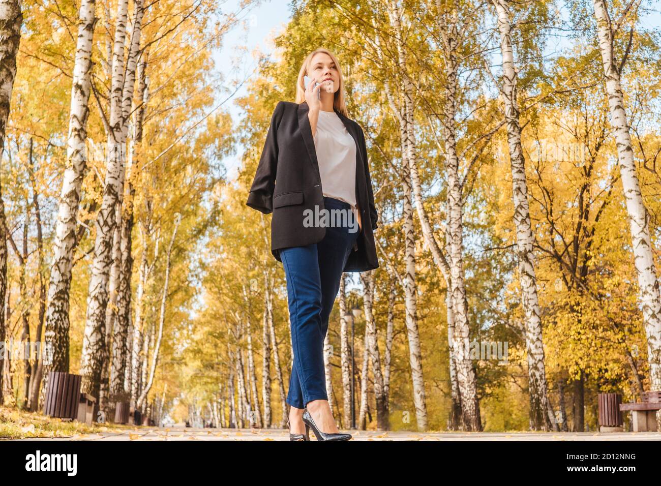 Businesswoman in black blazer hi-res stock photography and images - Alamy