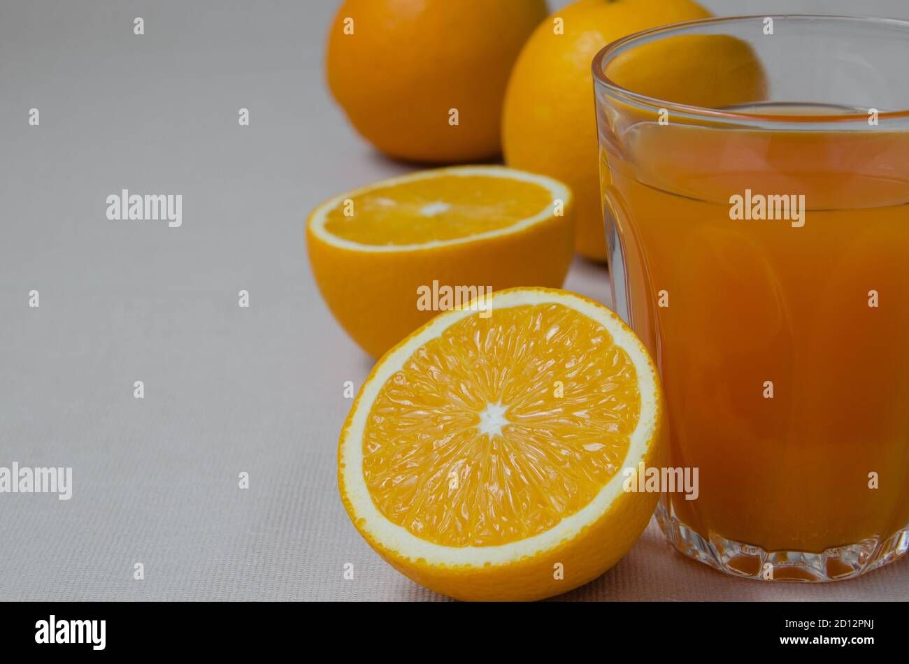 Organic Orange and Orange Juice Stock Photo - Alamy