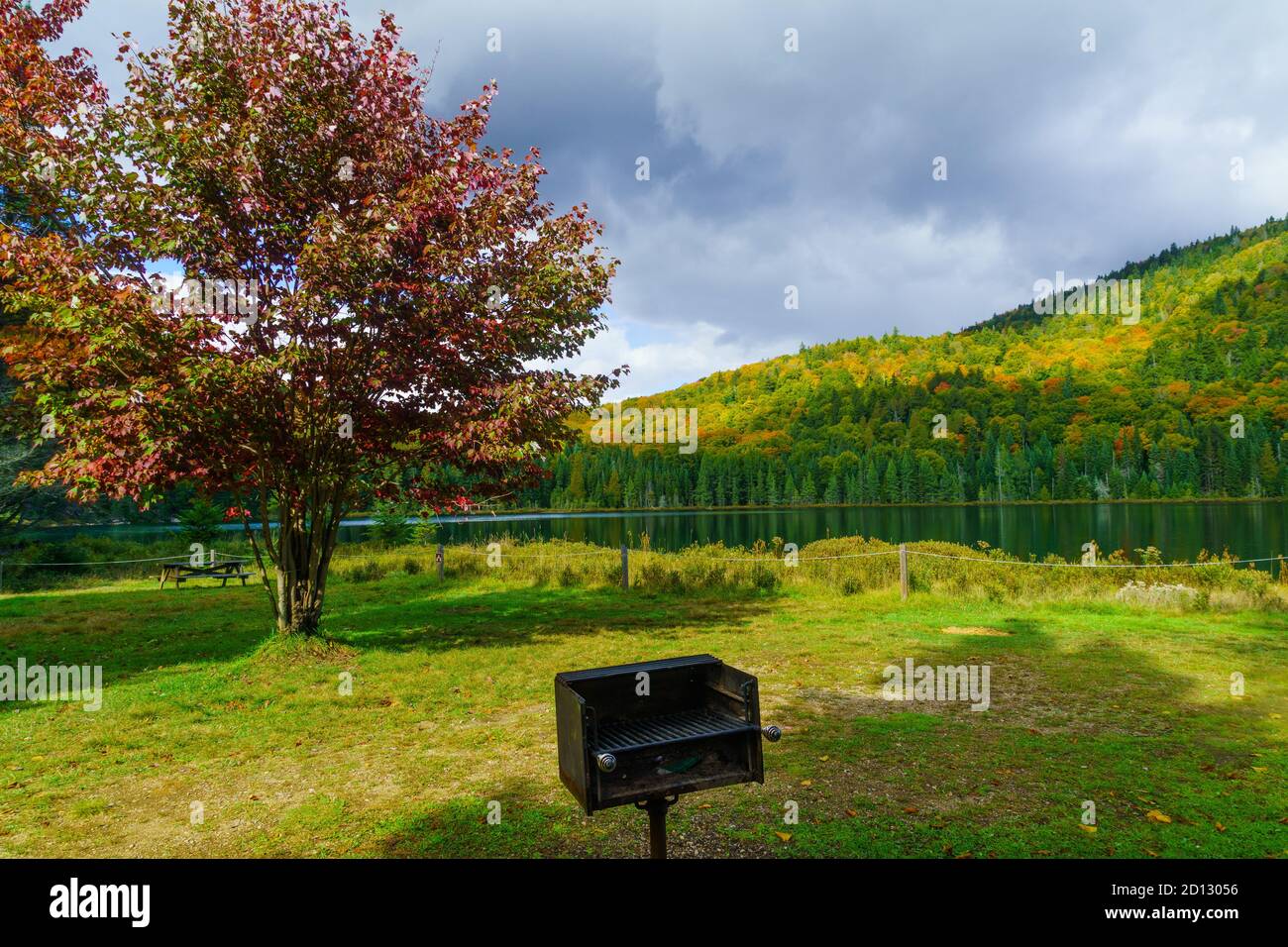 View of Lauzon lake and fall foliage colors, in Mont Tremblant National Park, Quebec, Canada