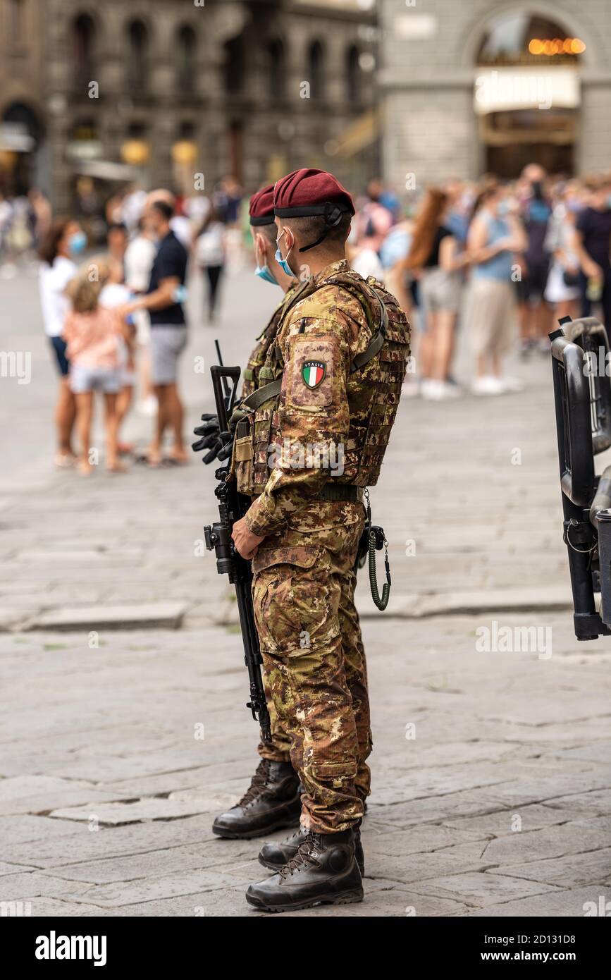 Two Italian Soldiers in Florence downtown for the operation Safe Roads (Strade Sicure, italian) as prevention against terrorist attacks. Stock Photo