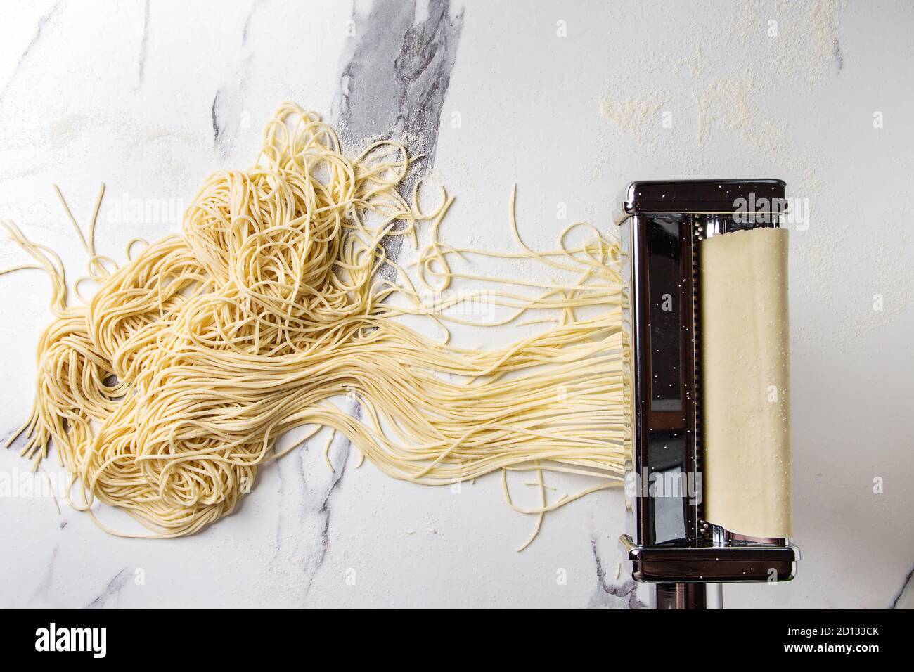 Rolled dough for homemade italian uncooked pasta spaghetti from pasta