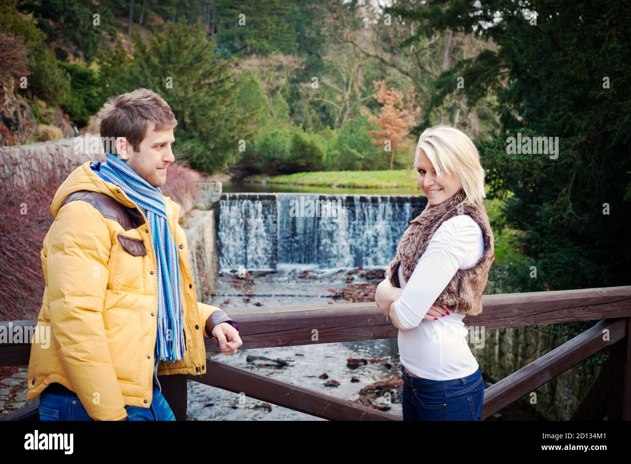 Two women standing on a bridge hi-res stock photography and images - Alamy
