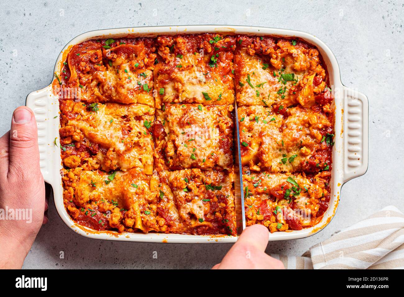 Traditional Italian Baked Lasagne with meat and cheese in dish. Italian