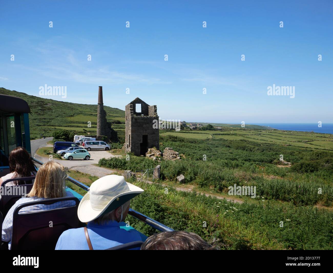The ruins of Carn Galver mine, west Cornwall, seen from the open-top 'bus. Stock Photo