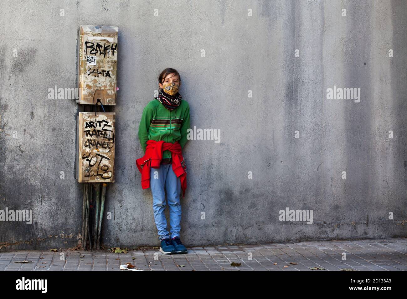 11 year-old boy wearing face mask / covering. Stock Photo
