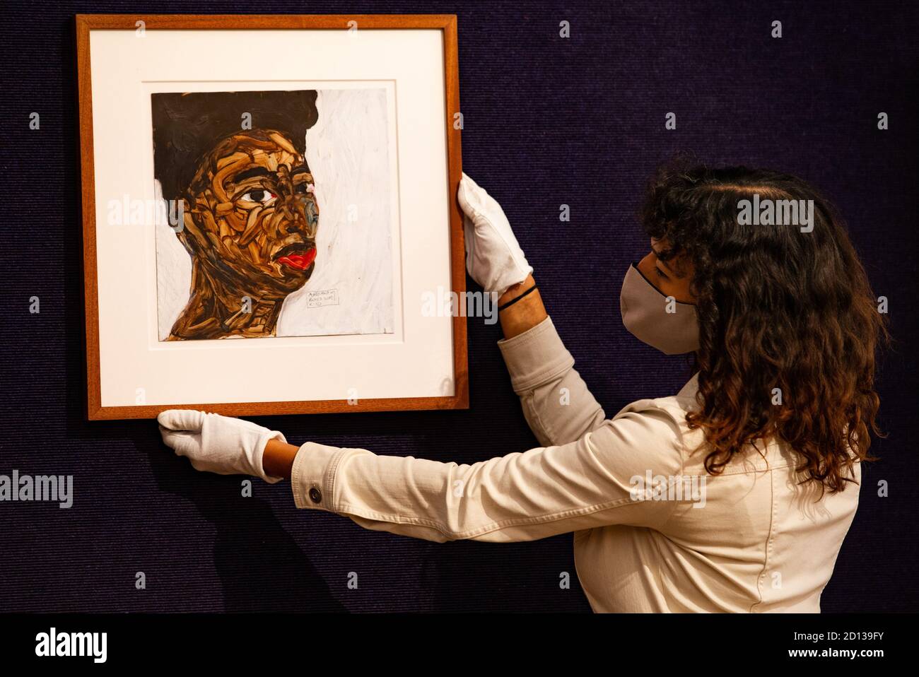 London, UK. 5th Oct, 2020. 'Portrait' by Amoako Boafo, Estimate £15,000- 20,000 Press Preview of Modern and Contemporary African Art sale at Bonhams Auction House. The auction is on on October 8th. Credit: Mark Thomas/Alamy Live News Stock Photo