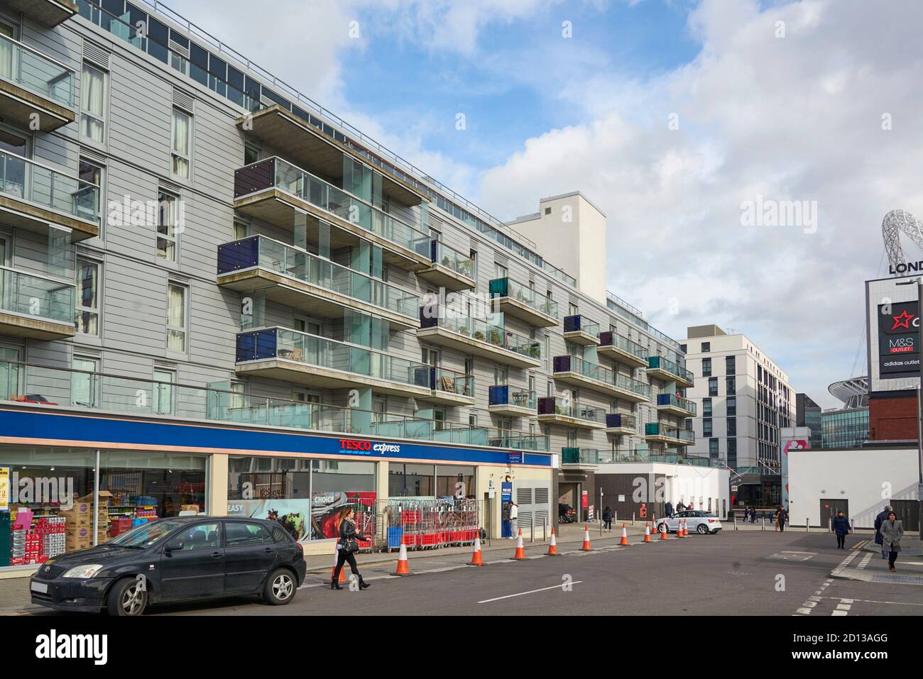 Street Scene, showing a Tesco Metro with apartments over, Wembley, North London, UK Stock Photo