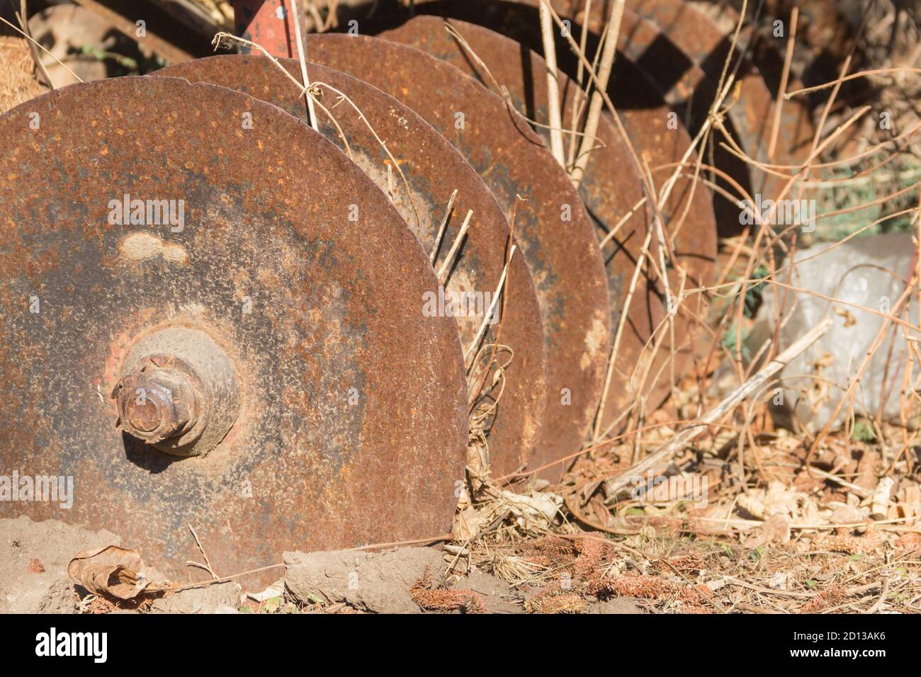 old abandoned plowing disc on the farm Stock Photo