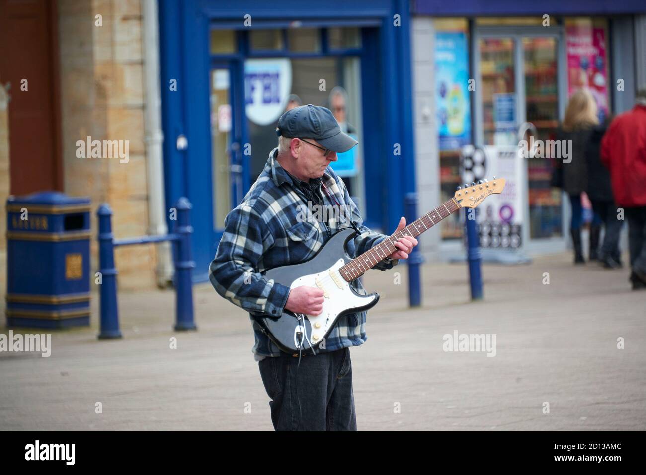 Busker at Coleraine town centre, Northern Ireland, UK Stock Photo