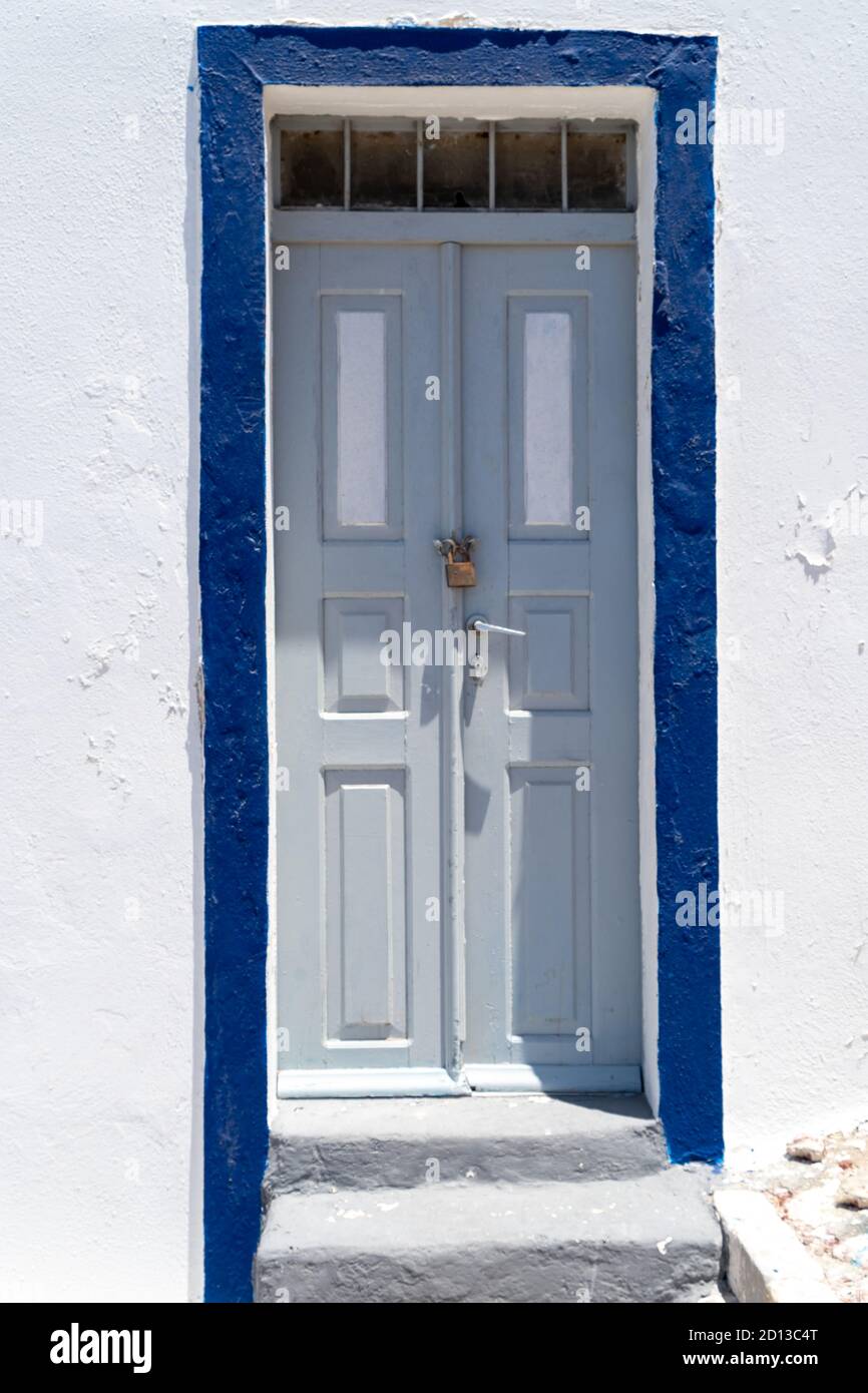 Blue door greek village hi-res stock photography and images - Alamy