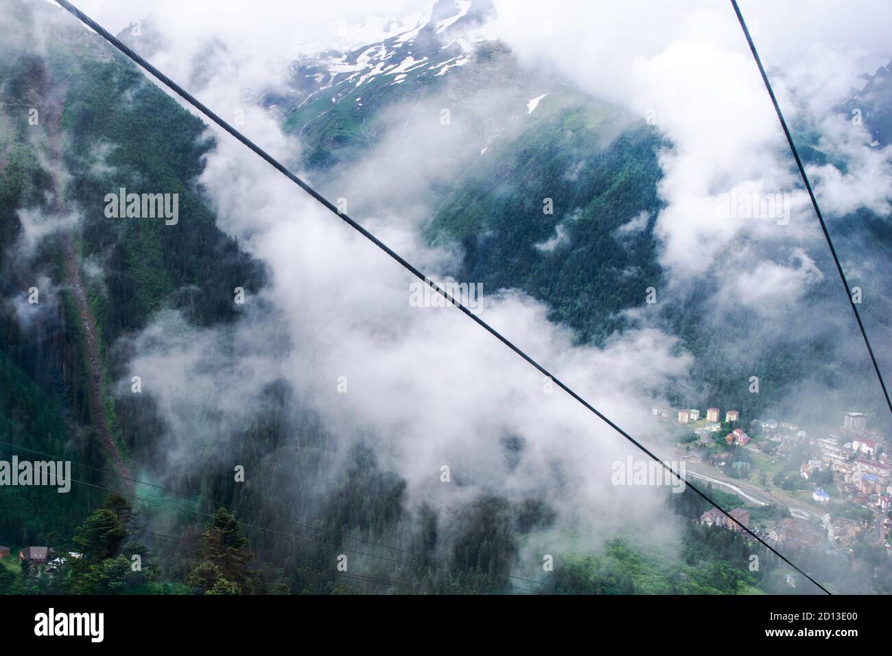 cable car on a mountain slope cable cars running up and down Stock Photo