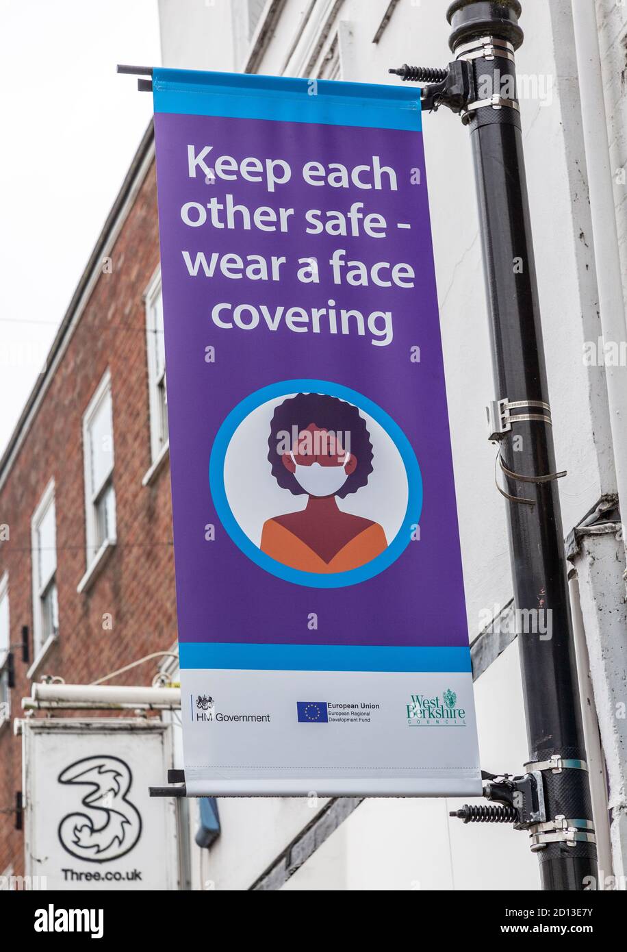 Keep each other safe wear a face covering Covid 19 information poster