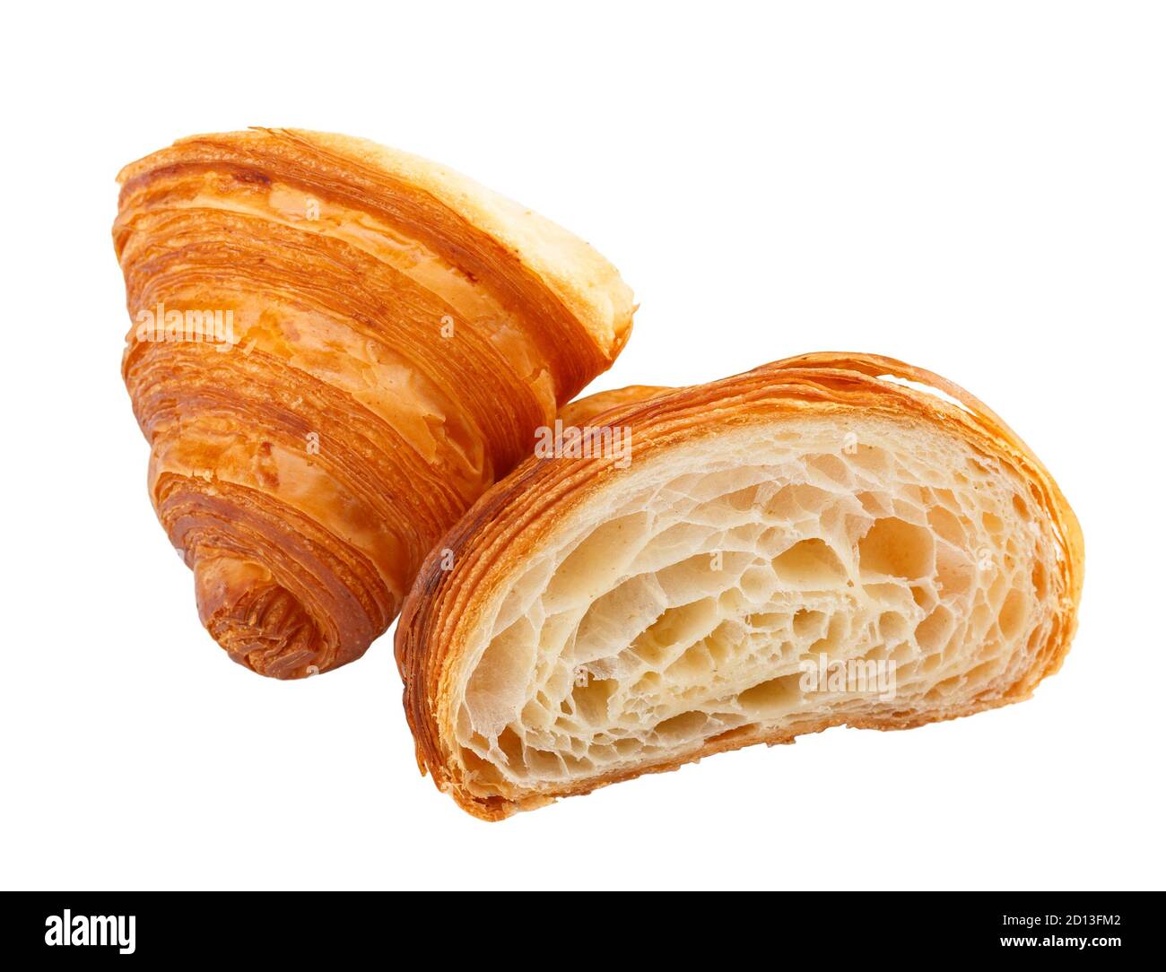 Freshly baked croissant cut in half isolated on white background, side