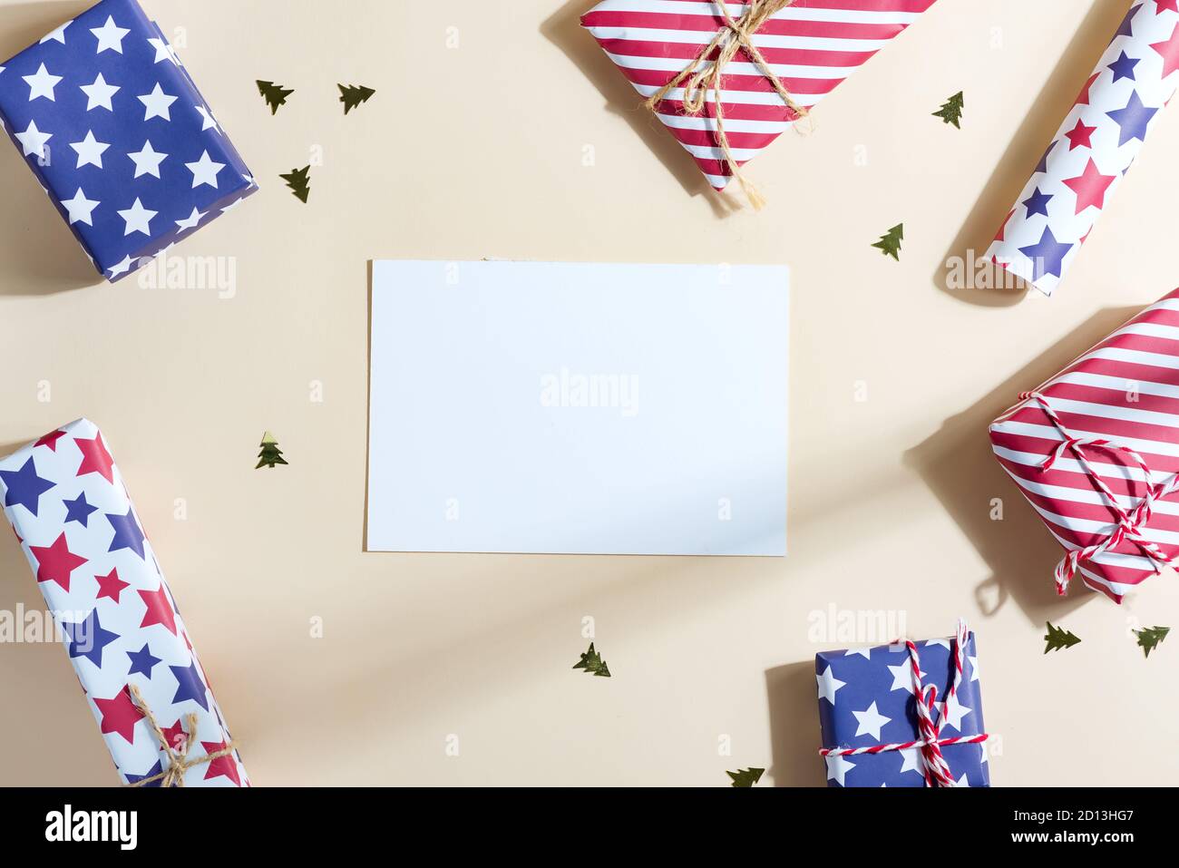 Greeting Christmas mock-up card with colorful gift boxes. Stock Photo
