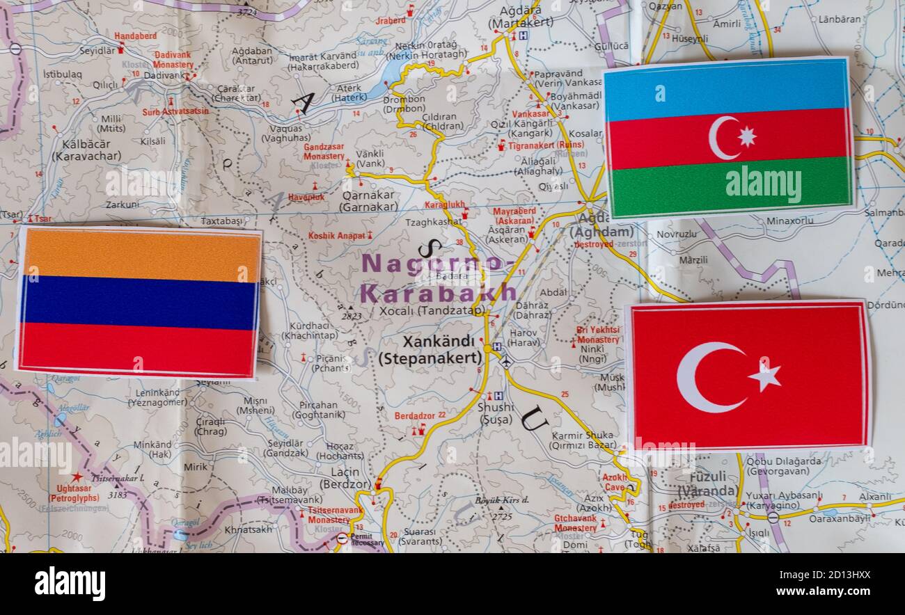Flags of Armenia, Azerbaijan and Turkey on the background of the map of Nagorno-Karabakh Stock Photo