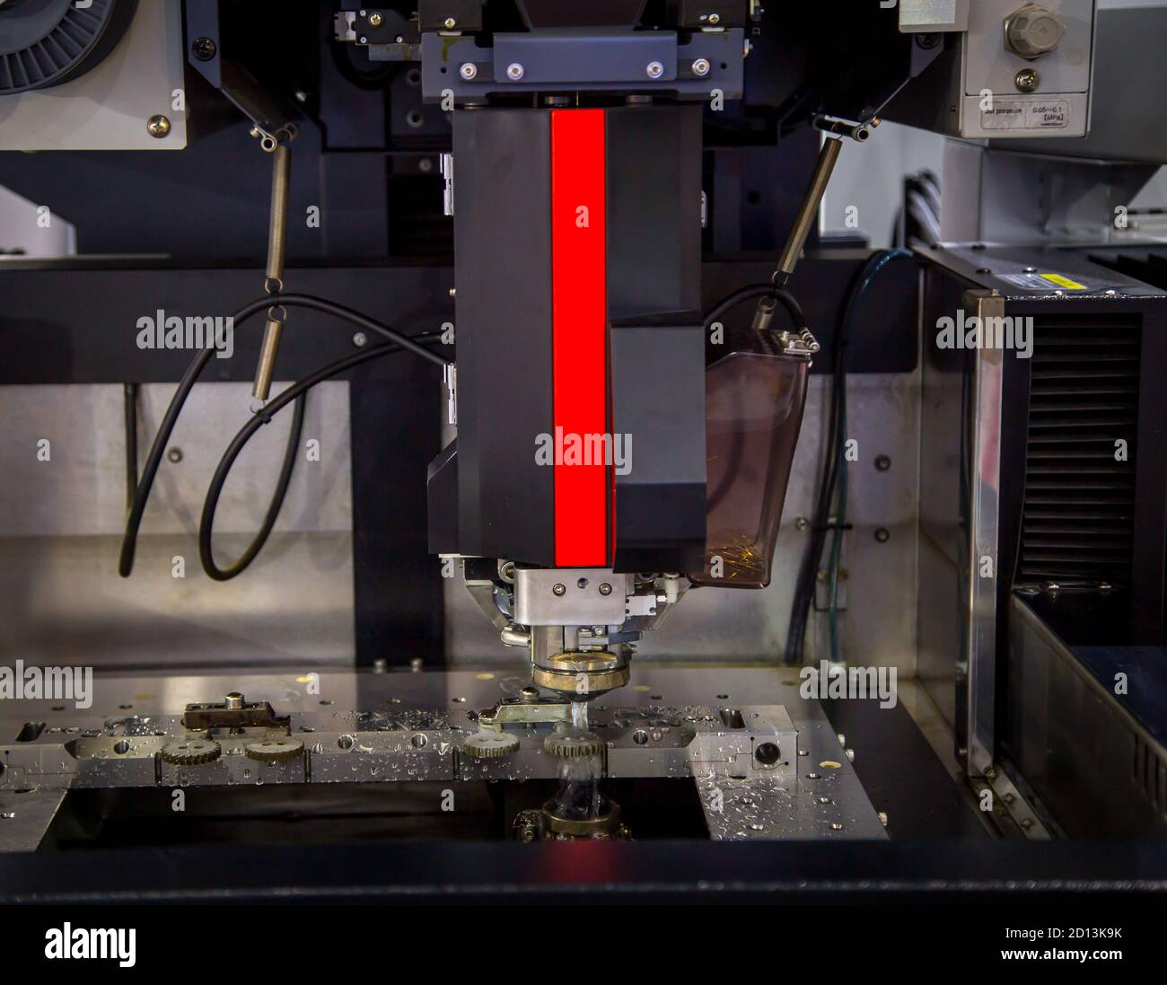 Electrical discharge machining (EDM) wire threader machine cutting