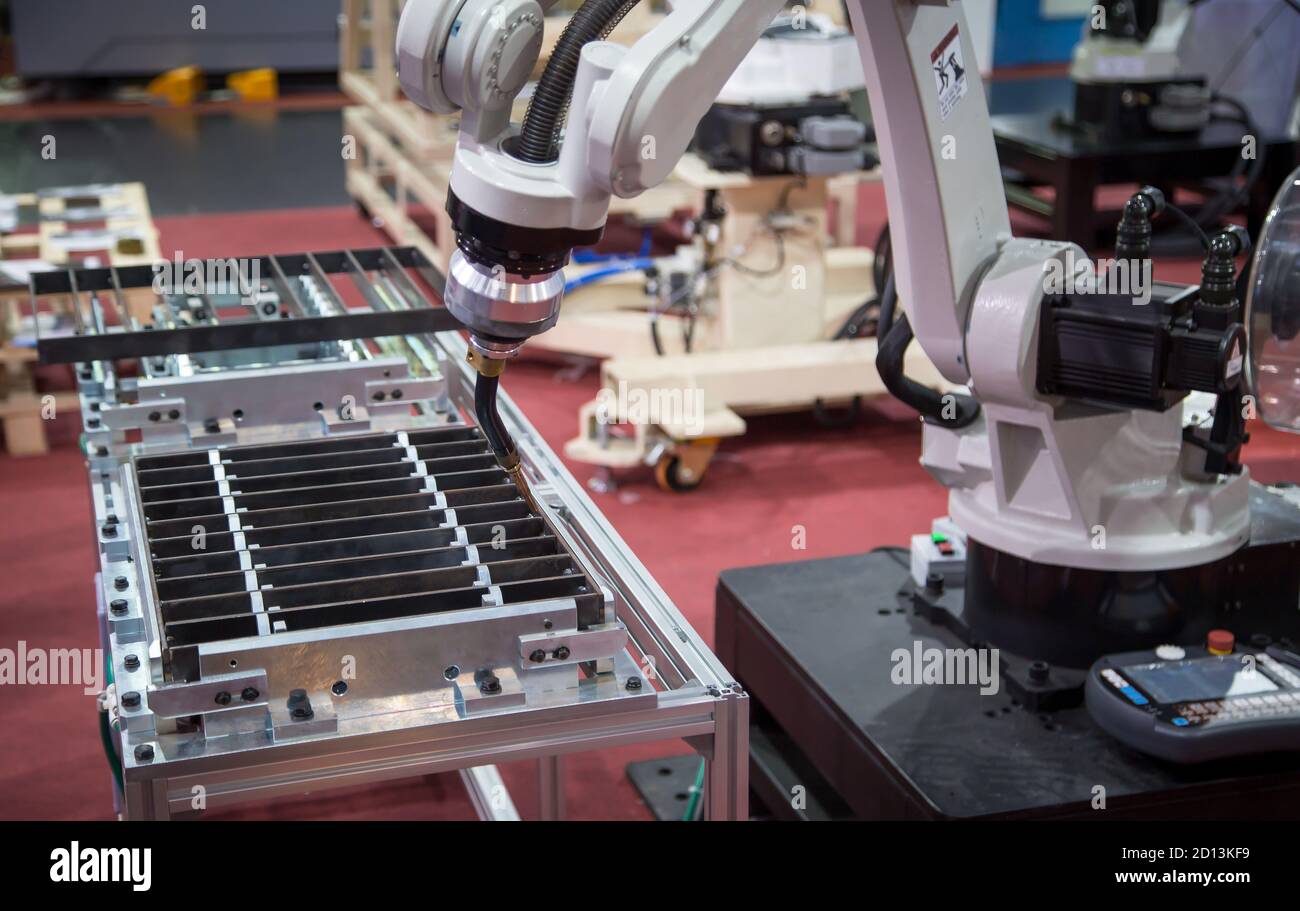Robotic welding machine. Industrial manufacturing production Stock Photo