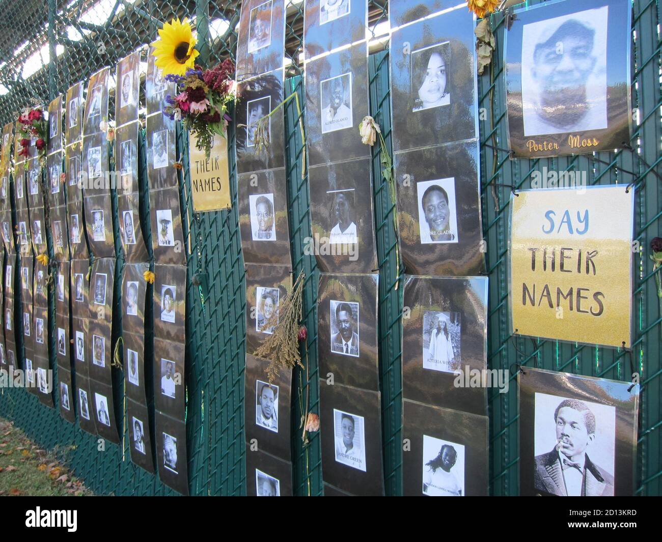 Cooperstown, NY / USA - October 1, 2020: 'Say Their Names' Black Lives Matter memorial photo display of black victims of white violence in upstate NY Stock Photo
