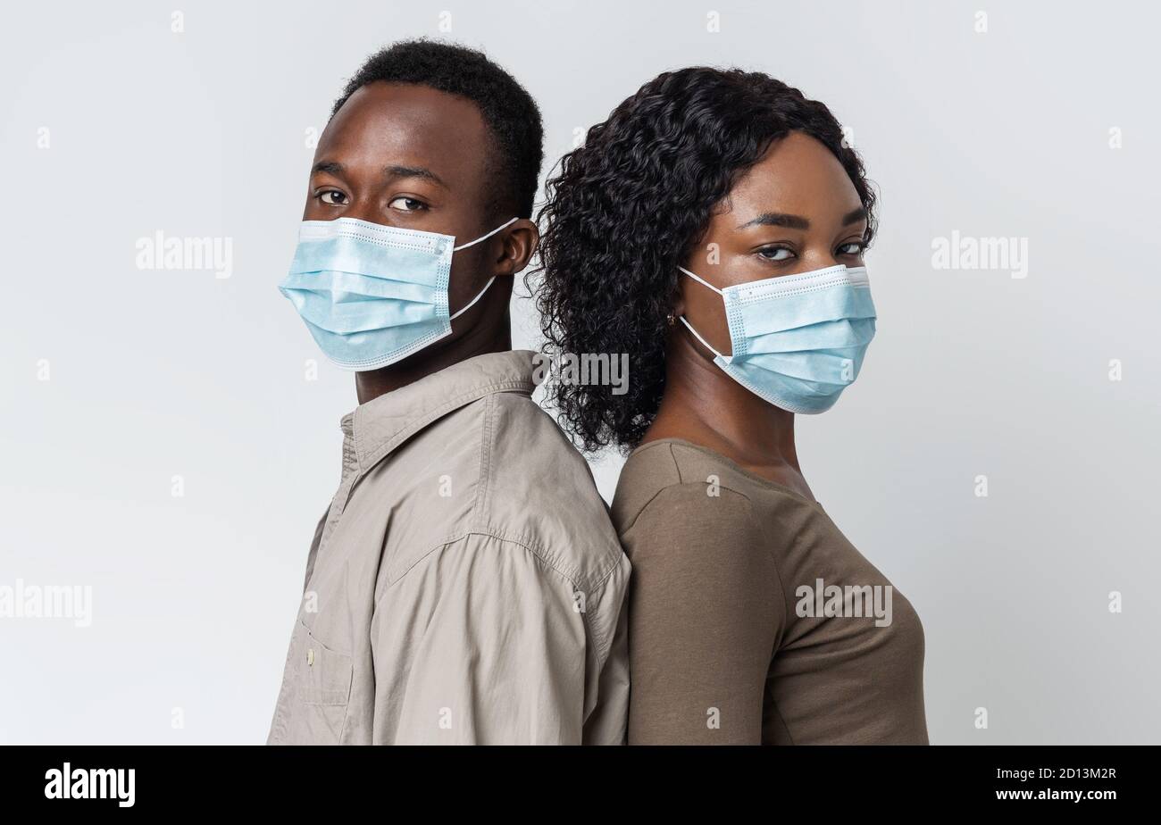 African american woman wearing grey hi-res stock photography and images ...
