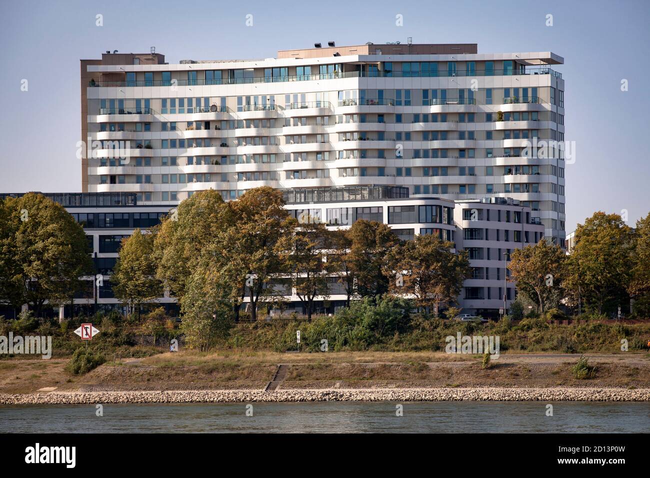 view over the Rhine to the Gustav-Heinemann-Quartier with the buildings Flow Office and Flow Tower in the district Bayenthal, Cologne, Germany.  Blick Stock Photo