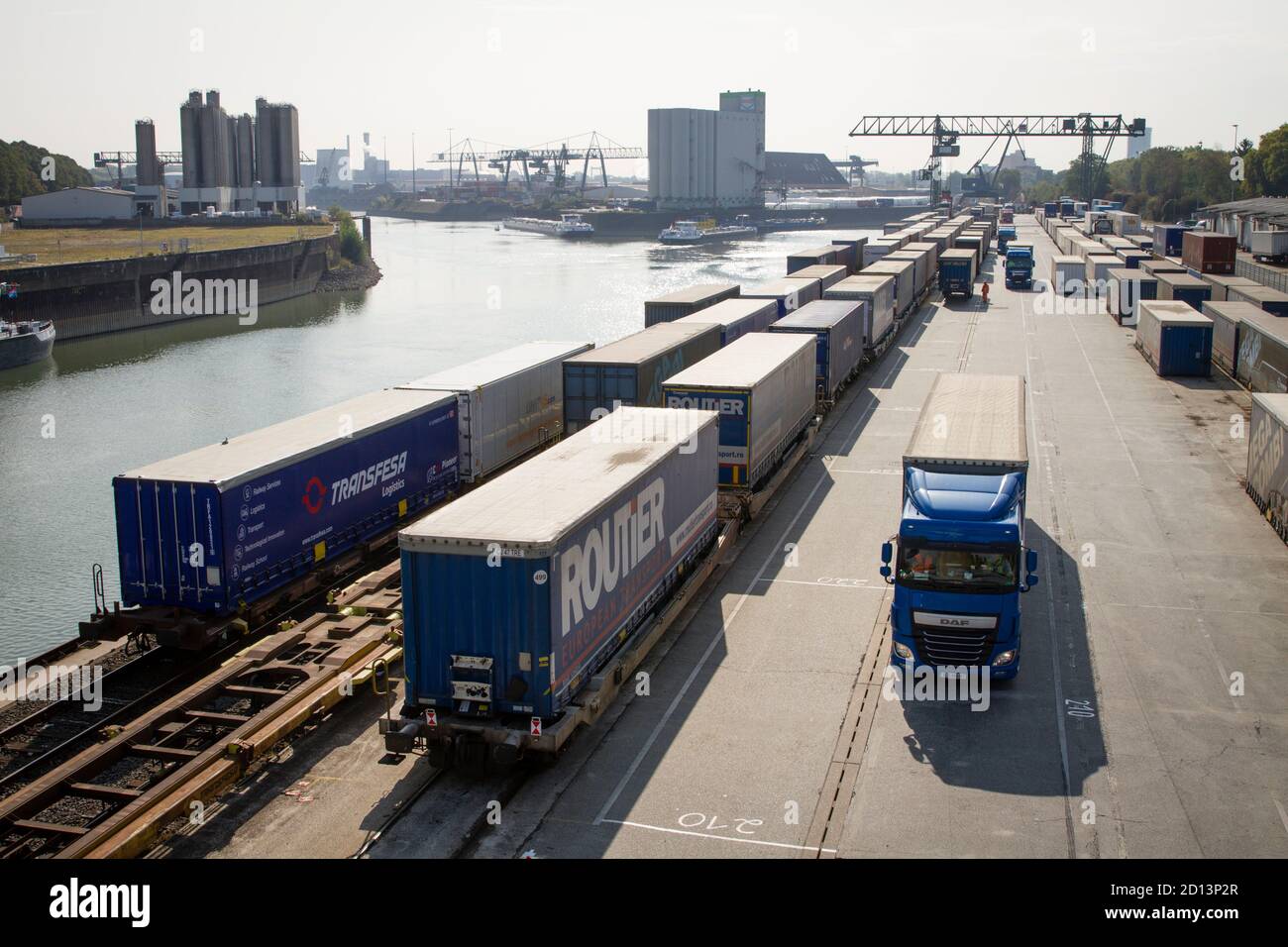 the container terminal of the Rhine port in the town district Niehl, Cologne, Germany.  Container-Terminal im Niehler Hafen, Koeln, Deutschland. Stock Photo