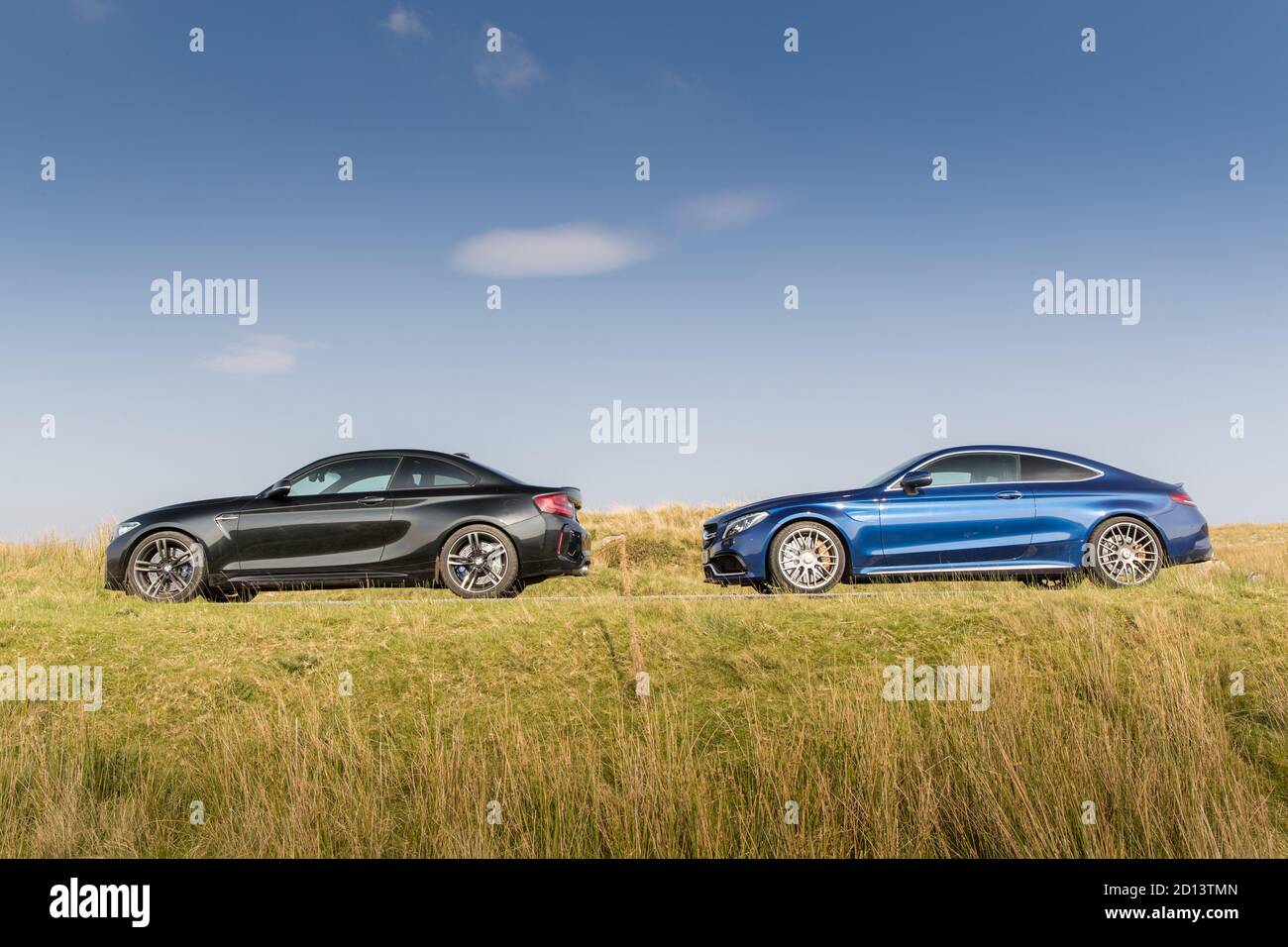 BMW M2, Mercedes C63 AMG during the road test of the year. Stock Photo