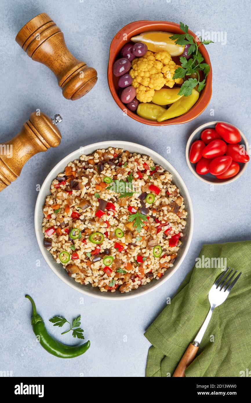 Bulgur pilaf with eggplant and vegetables. Top view with copy space Stock Photo Alamy