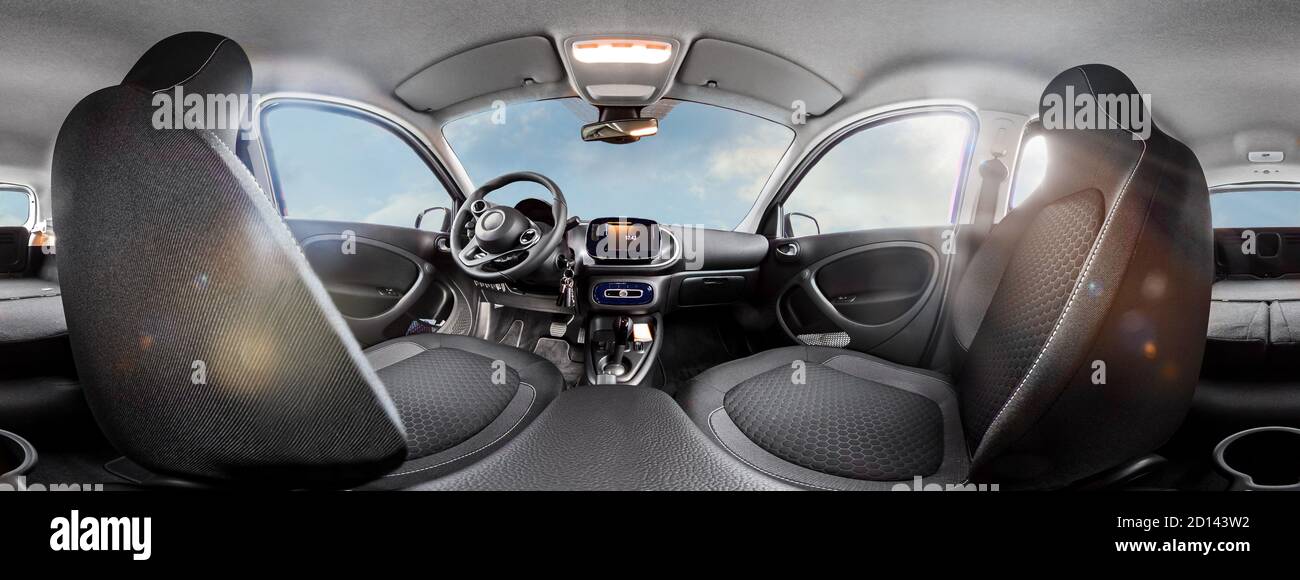 electric Car interior view as 360 degree panorama. The back seats are folded down for plenty of storage space. Stock Photo