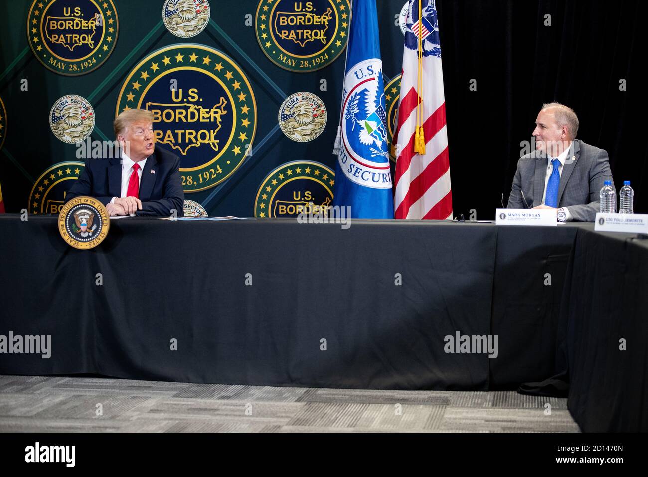 President Donald Trump, along with Acting Secretary Chad Wolf and Acting Commissioner Mark Morgan, visited the border wall in Yuma, Arizona on June 23, 2020. The visit marked the completion of 200 miles of new border wall constructed along the southwest border. Stock Photo