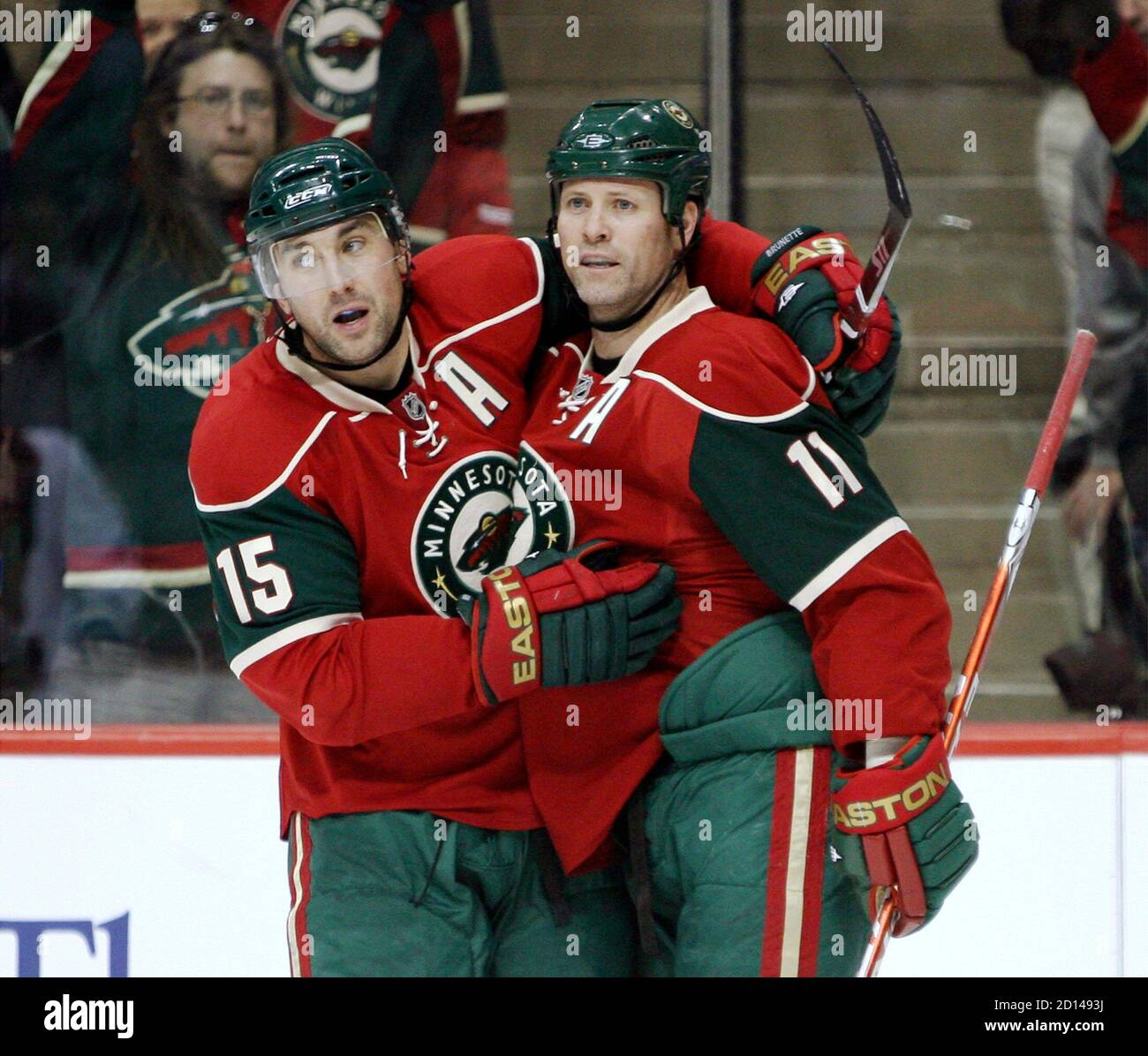 Minnesota Wild Andrew Brunette (15) and teammate Owen Nolan celebrate after Brunette's assist to Nolan's goal against Toronto Maple Leafs goaltender Justin Pogge during the third period of their NHL hockey game in the Xcel Energy Center in St. Paul, Minnesota January 27, 2009.           REUTERS/Eric Miller (UNITED STATES) Stock Photo