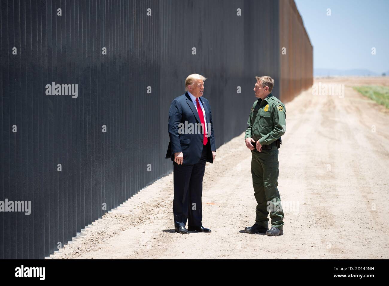 President Donald Trump, along with Acting Secretary Chad Wolf and Acting Commissioner Mark Morgan, visited the border wall in Yuma, Arizona on June 23, 2020. The visit marked the completion of 200 miles of new border wall constructed along the southwest border. Stock Photo