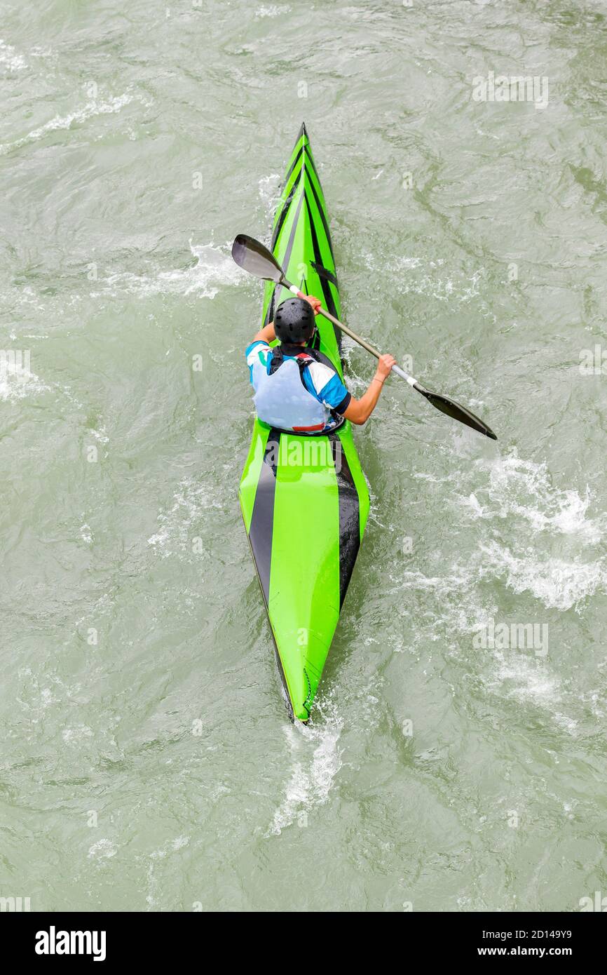 engaged athlete downhill with canoe Stock Photo