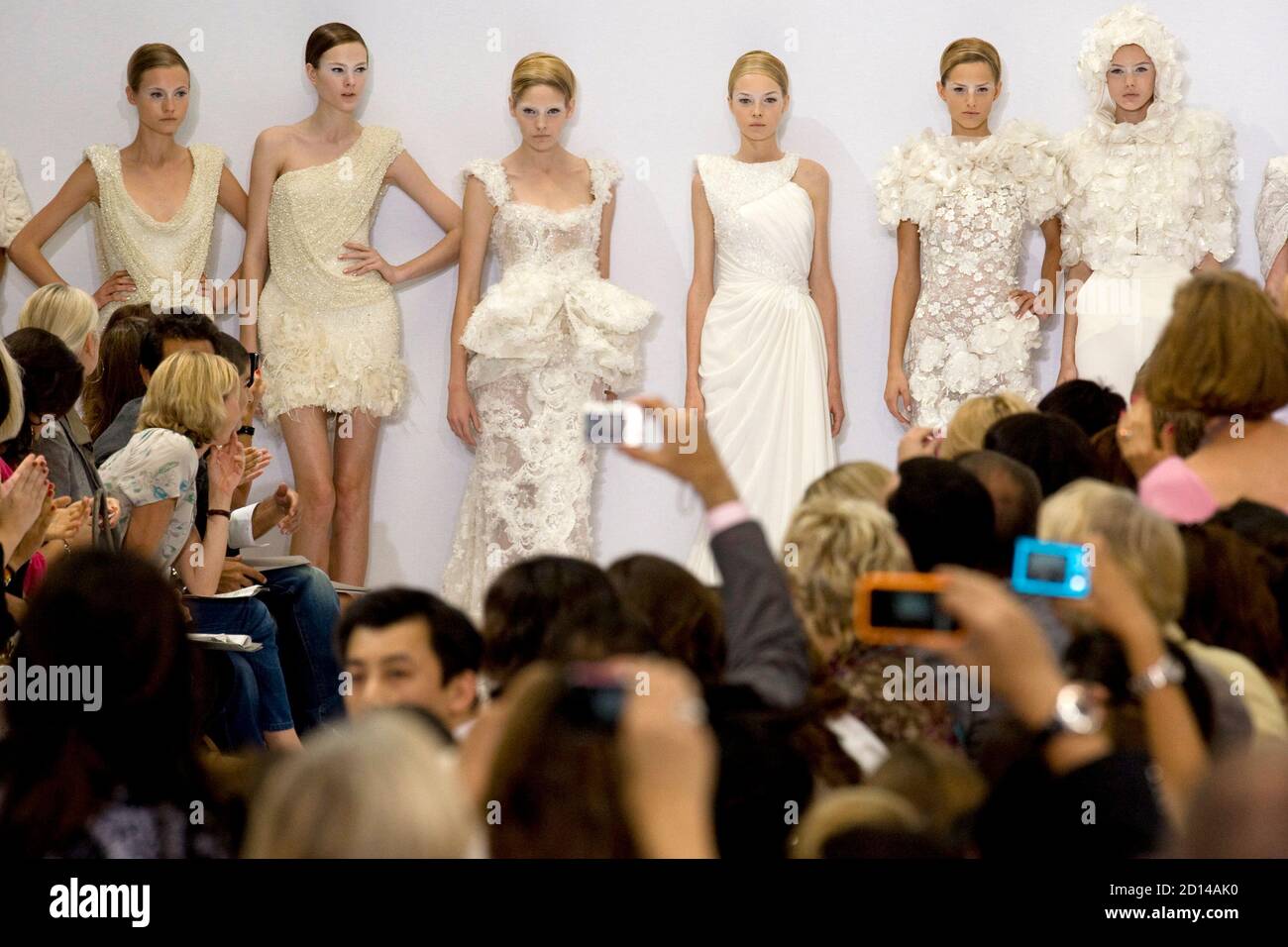 Models present creations by Lebanese designer Elie Saab as part of his Autumn/Winter 2009-2010 Haute Couture fashion show in Paris July 8, 2009. REUTERS/Pascal Rossignol (FRANCE FASHION) Stock Photo