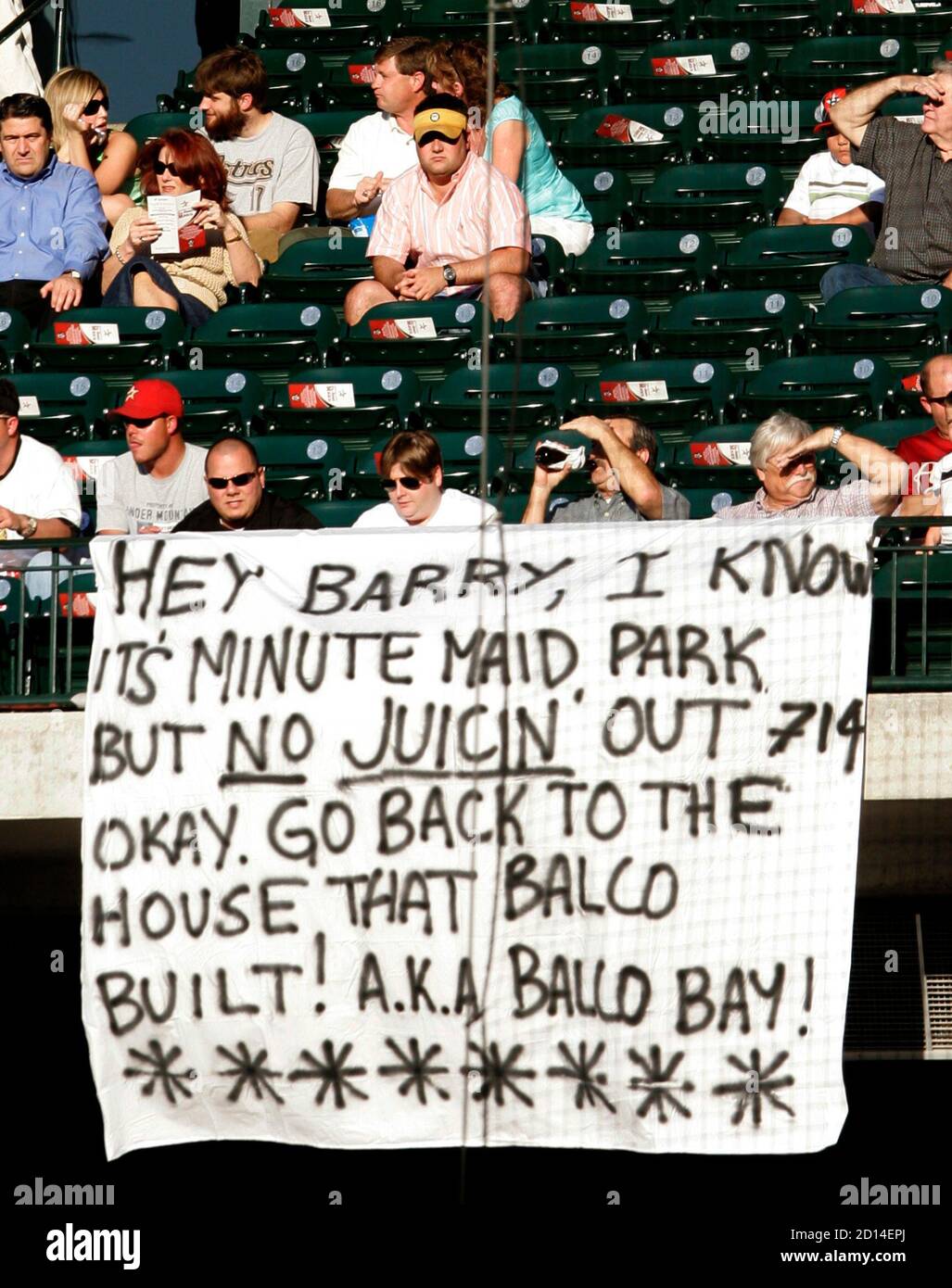 A sign hangs in Minute Maid park referring to San Francisco Giants Barry Bonds during the 1st inning of National League baseball action against Houston Astros in Houston, May 17, 2006. Bonds was not in the lineup for the game. REUTERS/Rick Wilking Stock Photo