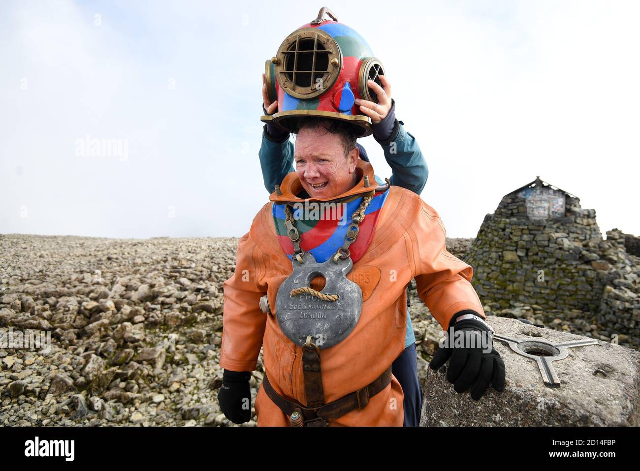 Whilst wearing a deep sea diving suit hi-res stock photography and ...
