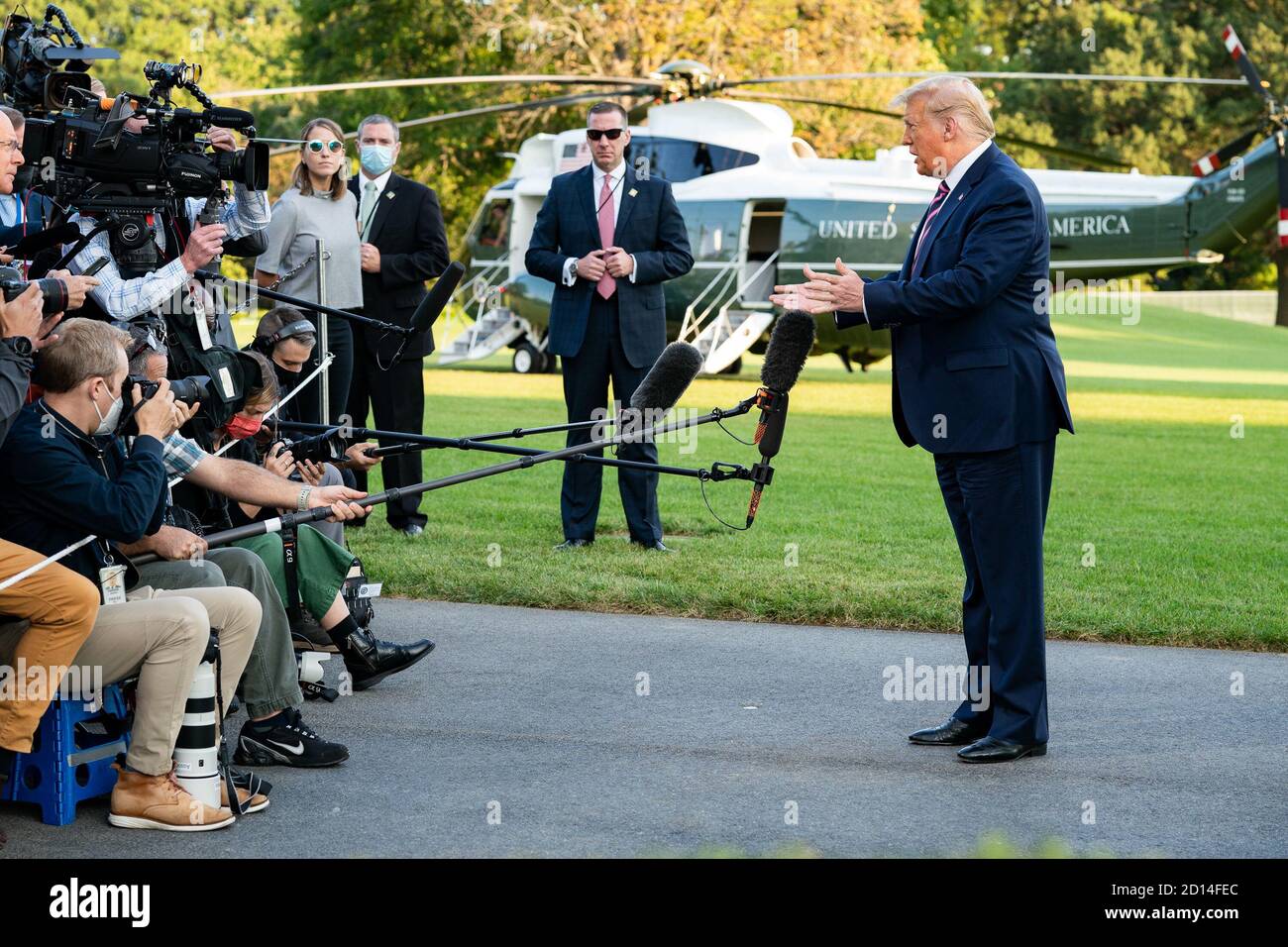 President Trump Travels to PA. President Donald J. Trump talks to members of the press along the South Lawn driveway of the White House Tuesday, Sept. 22, 2020, prior to boarding Marine One en route to Joint Base Andrews, Md. to begin his trip to Pennsylvania. Stock Photo