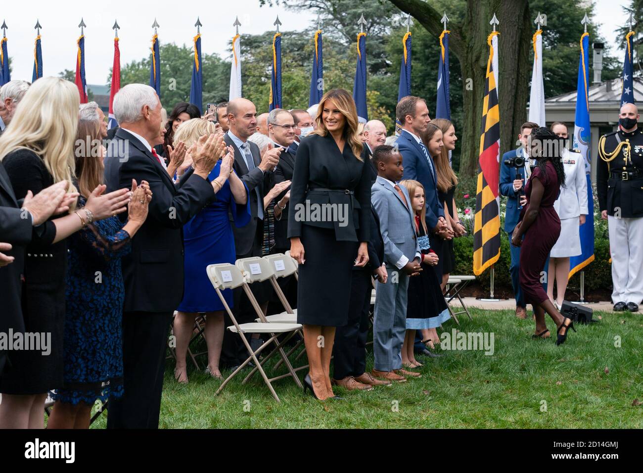 President Trump Nominates Judge Amy Coney Barrett for Associate Justice of the U.S. Supreme Court. First Lady Melania Trump receives applause as she arrives to attend President Donald J. Trump’s announcement of Judge Amy Coney Barrett as his nominee for Associate Justice of the Supreme Court of the United States Saturday, Sept. 26, 2020, in the Rose Garden of the White House. Stock Photo