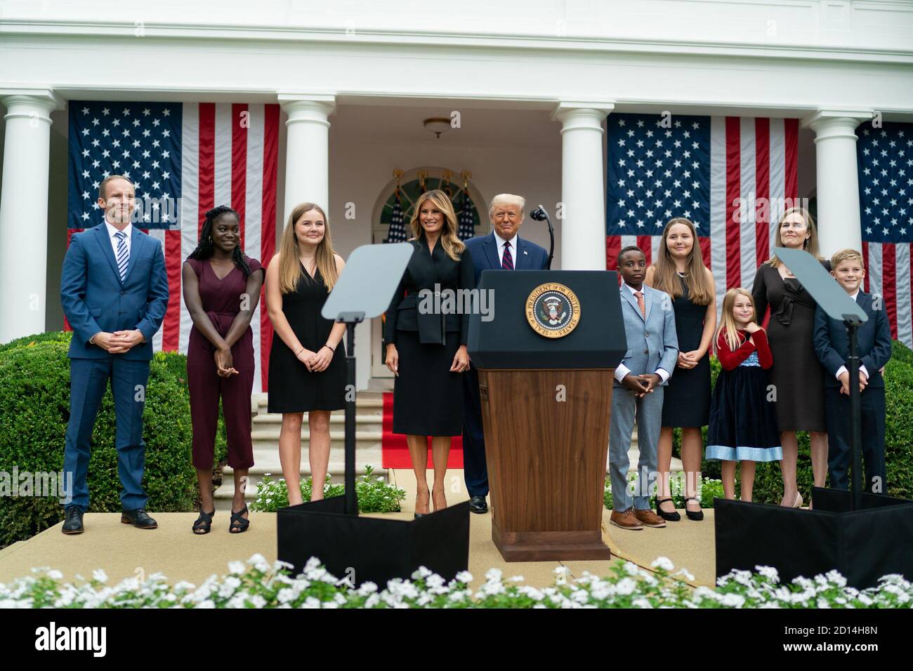 President Trump Nominates Judge Amy Coney Barrett for Associate Justice of the U.S. Supreme Court. President Donald J. Trump and First Lady Melania Trump pose for a photo with Judge Amy Coney Barrett and her family members after being announced as the President’s nominee for Associate Justice of the Supreme Court of the United States Saturday, Sept. 26, 2020, in the Rose Garden of the White House. Stock Photo