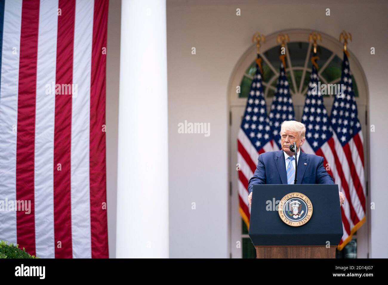 White House Update on Coronavirus Testing. President Donald J. Trump listens as Vice President Mike Pence addresses his remarks during an update on the nation’s COVID-19 Coronavirus testing strategy Monday, Sept. 28, 2020, in the Rose Garden of the White House. Stock Photo