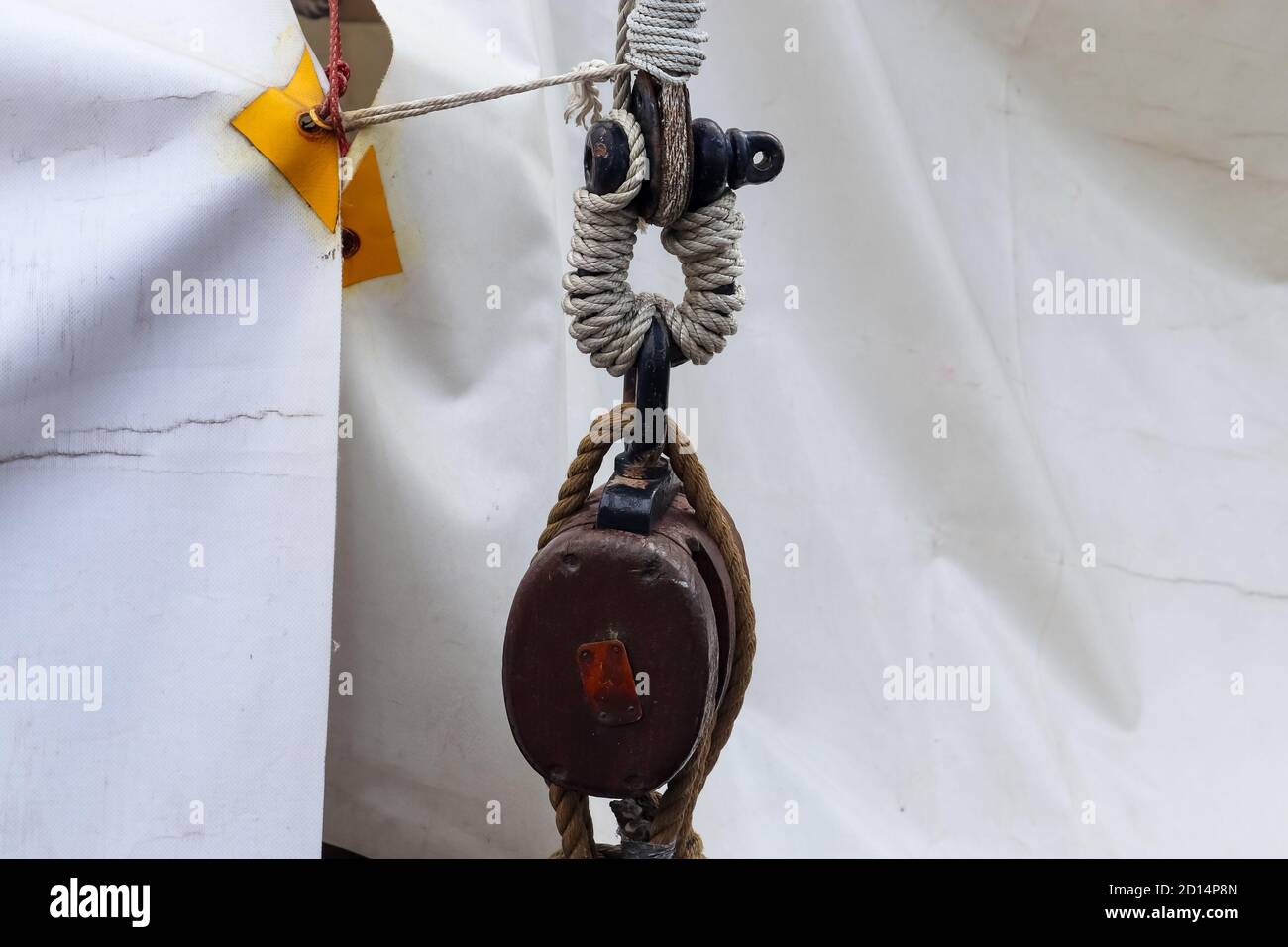 Closeup of old rope pulley of a ship Stock Photo - Alamy